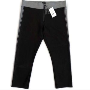 Black High-Waist Performance Cropped Leggings with Gray Waistband and Leg Stripe